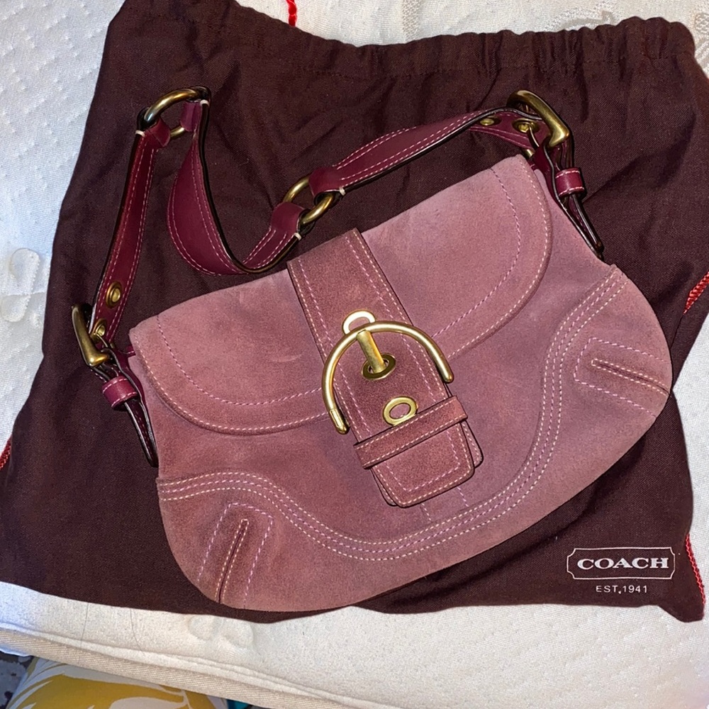 COACH purple leather clutch/SM purse with strap.
